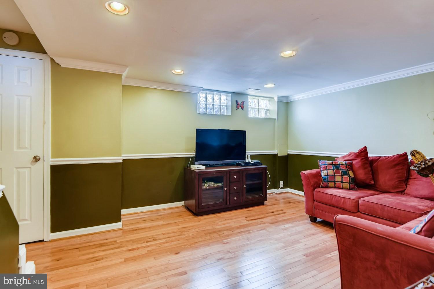 8322 Byington Road Towson, MD 21286 - Photo 21 of 31 Glass block windows / hardwood floors