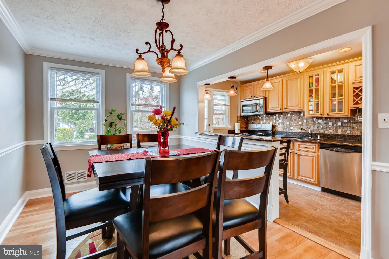 8322 Byington Road Towson, MD 21286 - Photo 8 of 31 Formal dining room opens up to kitchen
