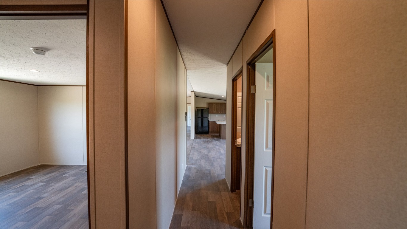 1121 Callihan Road Luling, TX 78648 - Photo 15 of 35 a view of a bathroom from a hallway