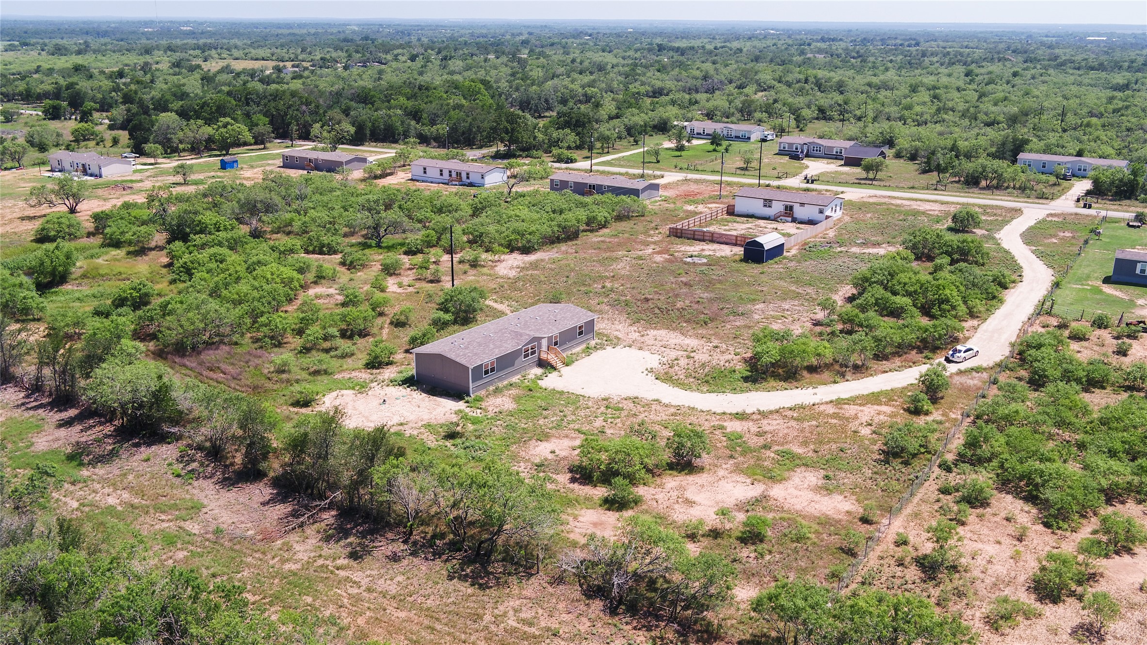 1121 Callihan Road Luling, TX 78648 - Photo 32 of 35 Bird's eye view of a heavily wooded area