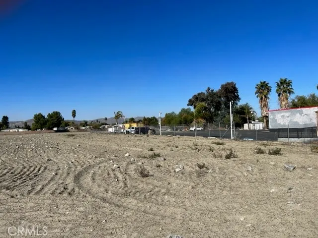 a view of a street with an ocean view