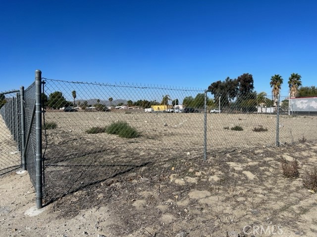 1060 South State Street San Jacinto, CA 92582 - Photo 20 of 24 a view of a dry yard with wooden fence