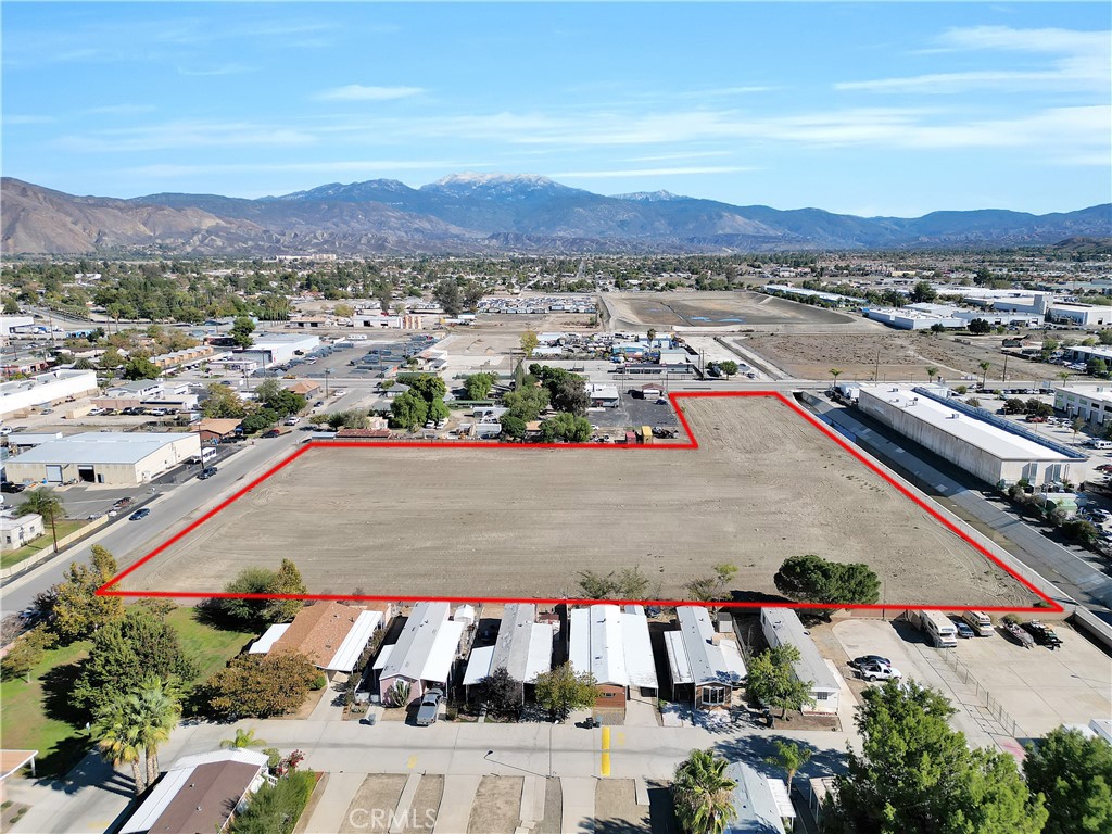 1060 South State Street San Jacinto, CA 92582 - Photo 4 of 24 an aerial view of residential houses with outdoor space