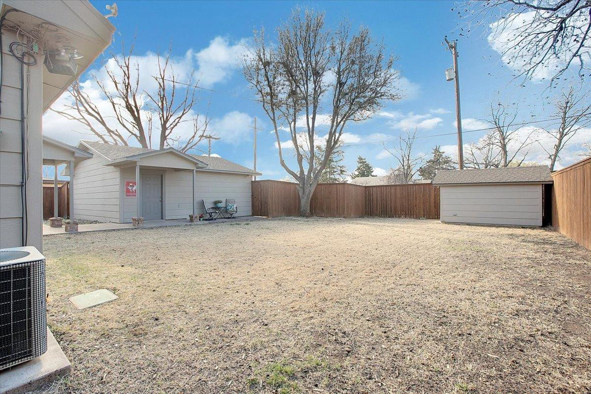 3203 32nd Street Lubbock, TX 79410 - Photo 25 of 27 a front view of house with yard