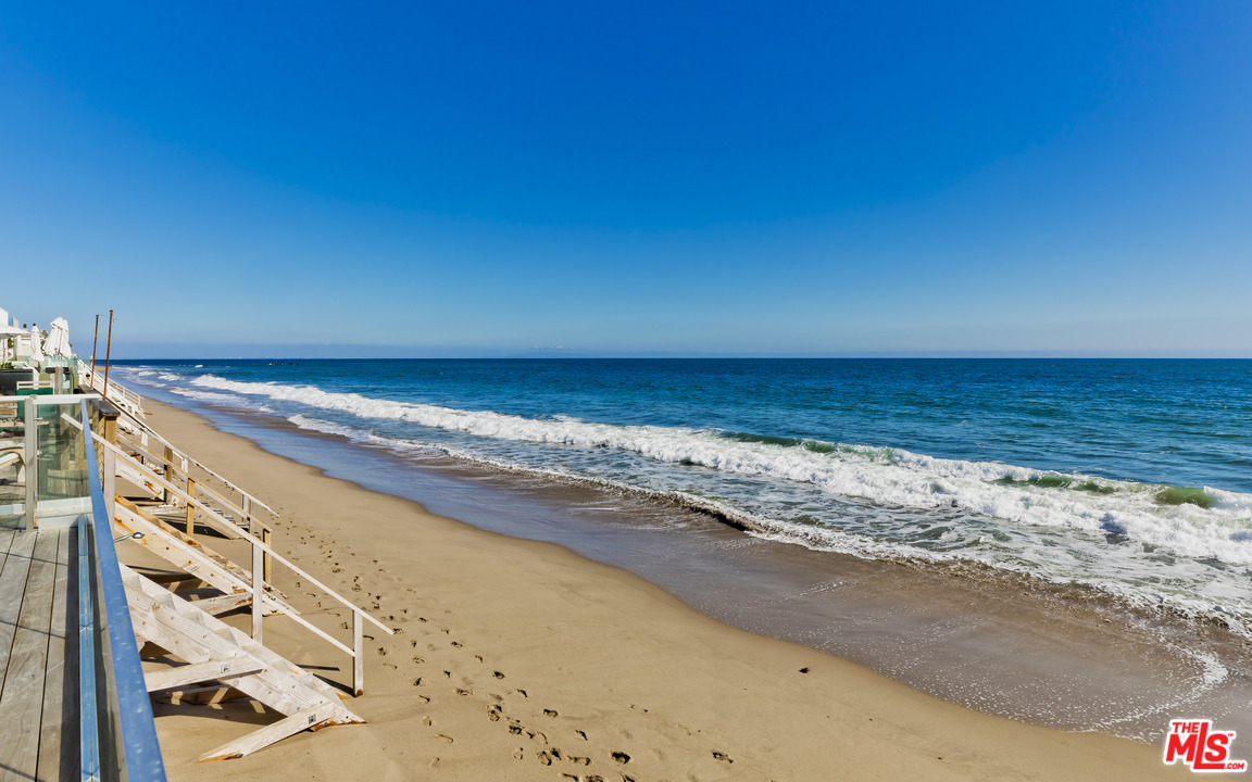 23626 Malibu Colony Road, Unit 53 Malibu, CA 90265 - Photo 2 of 24 a view of an ocean beach