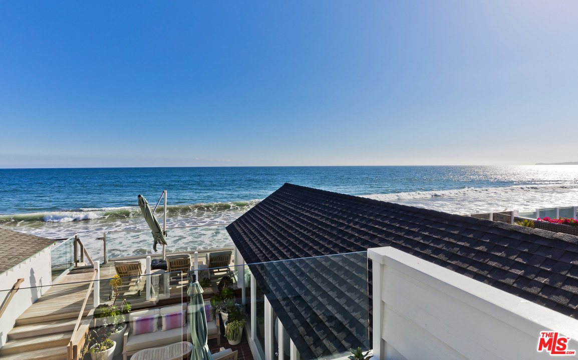 23626 Malibu Colony Road, Unit 53 Malibu, CA 90265 - Photo 17 of 24 a view of roof with two chairs