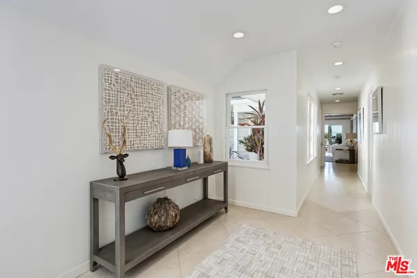 a view of entryway with livingroom and furniture