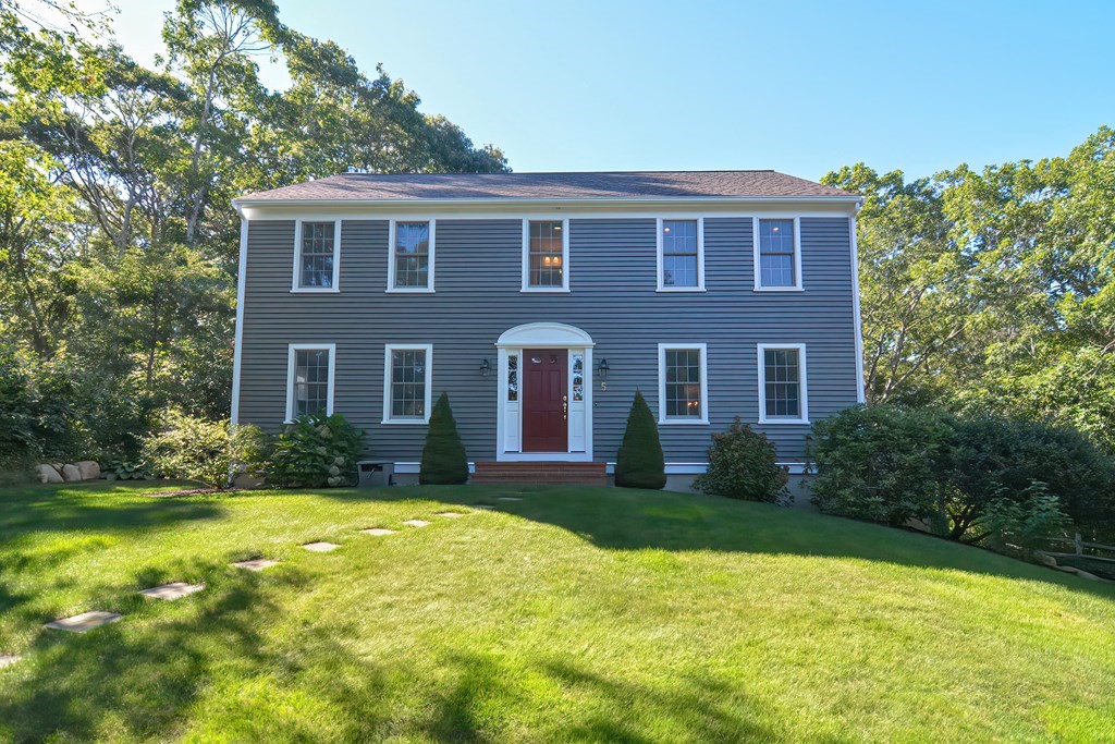 5 Tower Hill Drive Sandwich, MA 02563 - Photo 1 of 41 a front view of house with yard and green space