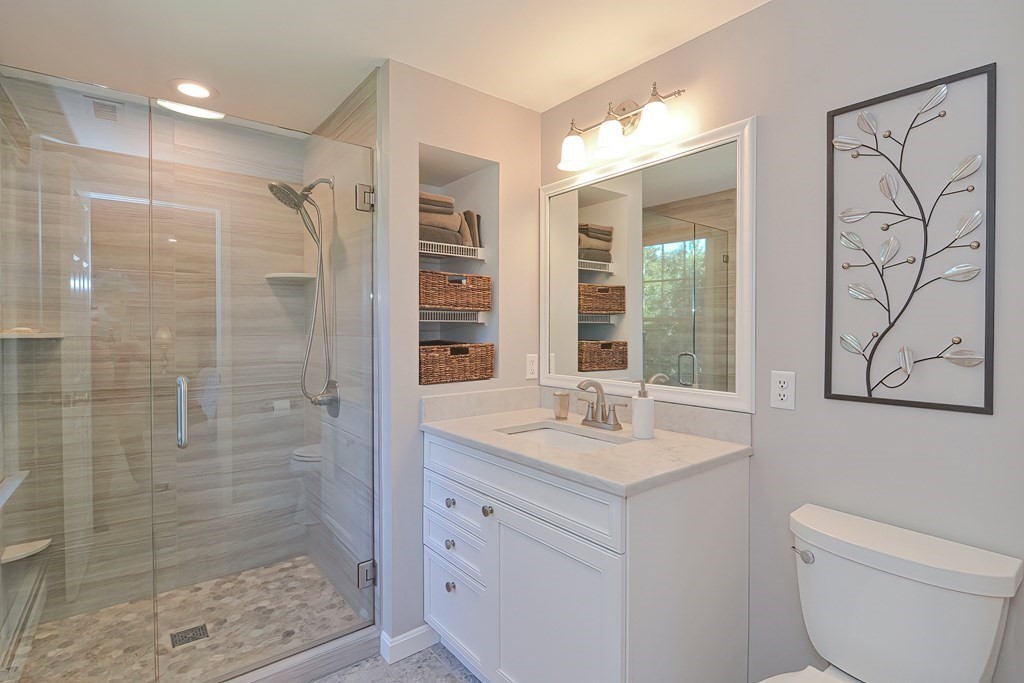 5 Tower Hill Drive Sandwich, MA 02563 - Photo 26 of 41 a bathroom with a granite countertop sink toilet and shower