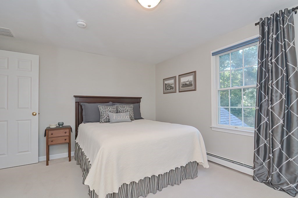 5 Tower Hill Drive Sandwich, MA 02563 - Photo 30 of 41 a bedroom with a bed and a window