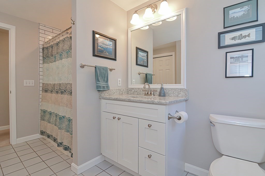 5 Tower Hill Drive Sandwich, MA 02563 - Photo 34 of 41 a bathroom with a granite countertop sink toilet and shower