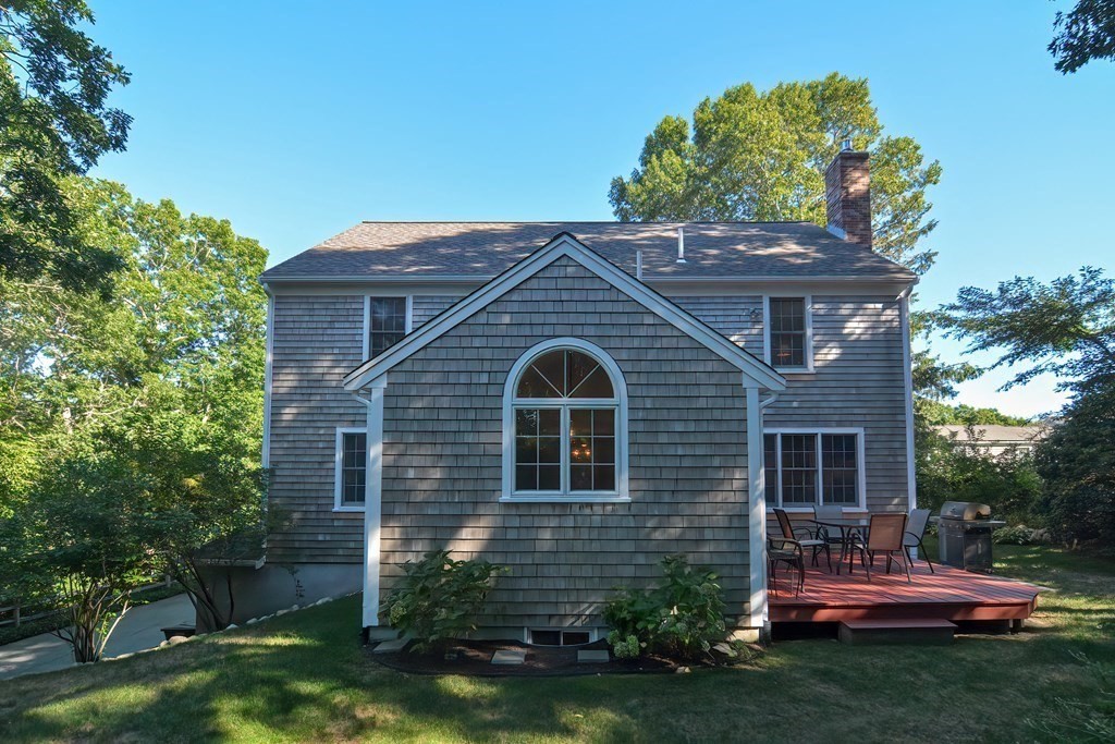 5 Tower Hill Drive Sandwich, MA 02563 - Photo 38 of 41 a front view of a house with a garden