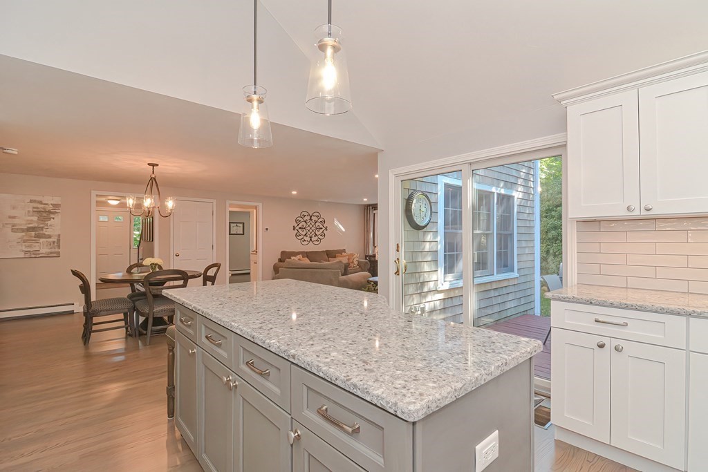 5 Tower Hill Drive Sandwich, MA 02563 - Photo 6 of 41 a kitchen with center island and living room