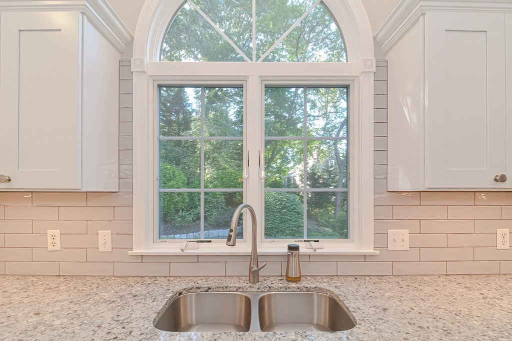 5 Tower Hill Drive Sandwich, MA 02563 - Photo 7 of 41 a kitchen with granite countertop a sink and a window