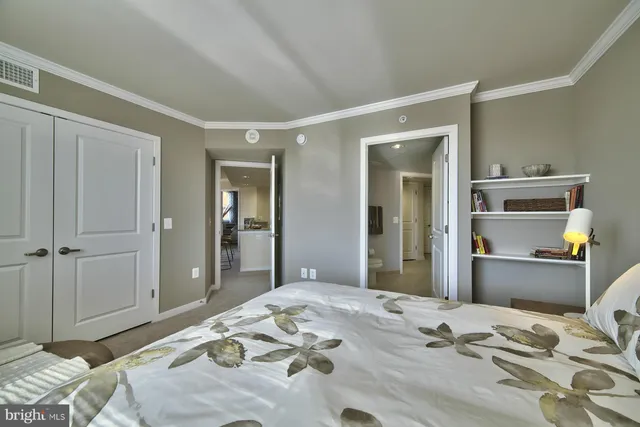 a spacious bathroom with a toilet sink and shower