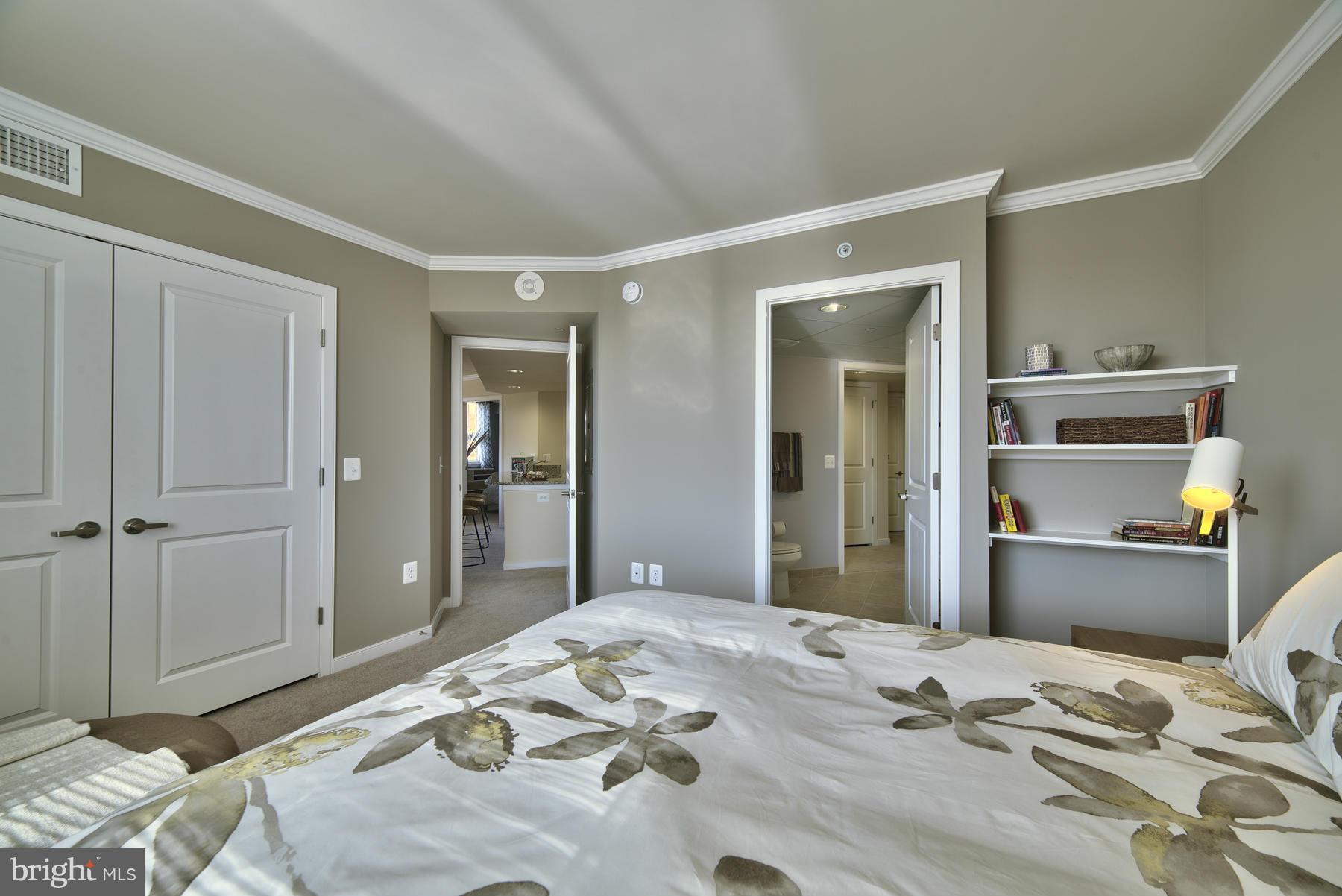 2700 Dorr Avenue, Unit 2 BR 2 Fairfax, VA 22031 - Photo 16 of 30 a bedroom with a bed and a mirror
