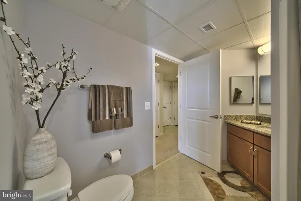 a view of a hallway with a couch