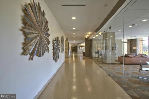 a living room with fireplace furniture and a flat screen tv