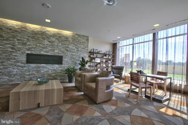 a view of a workspace with furniture