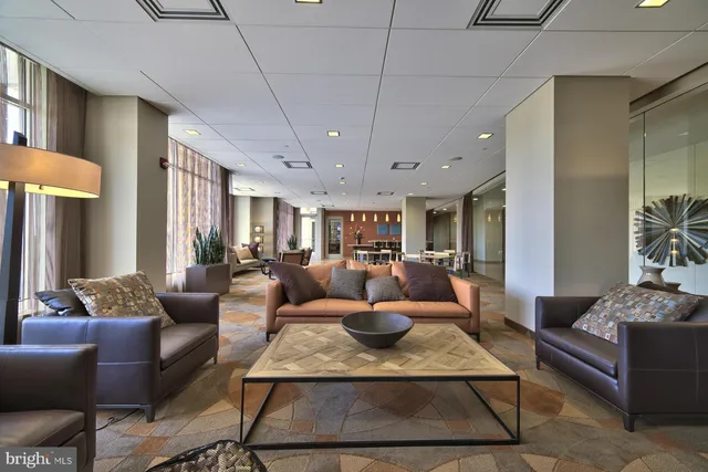 a view of swimming pool with outdoor seating