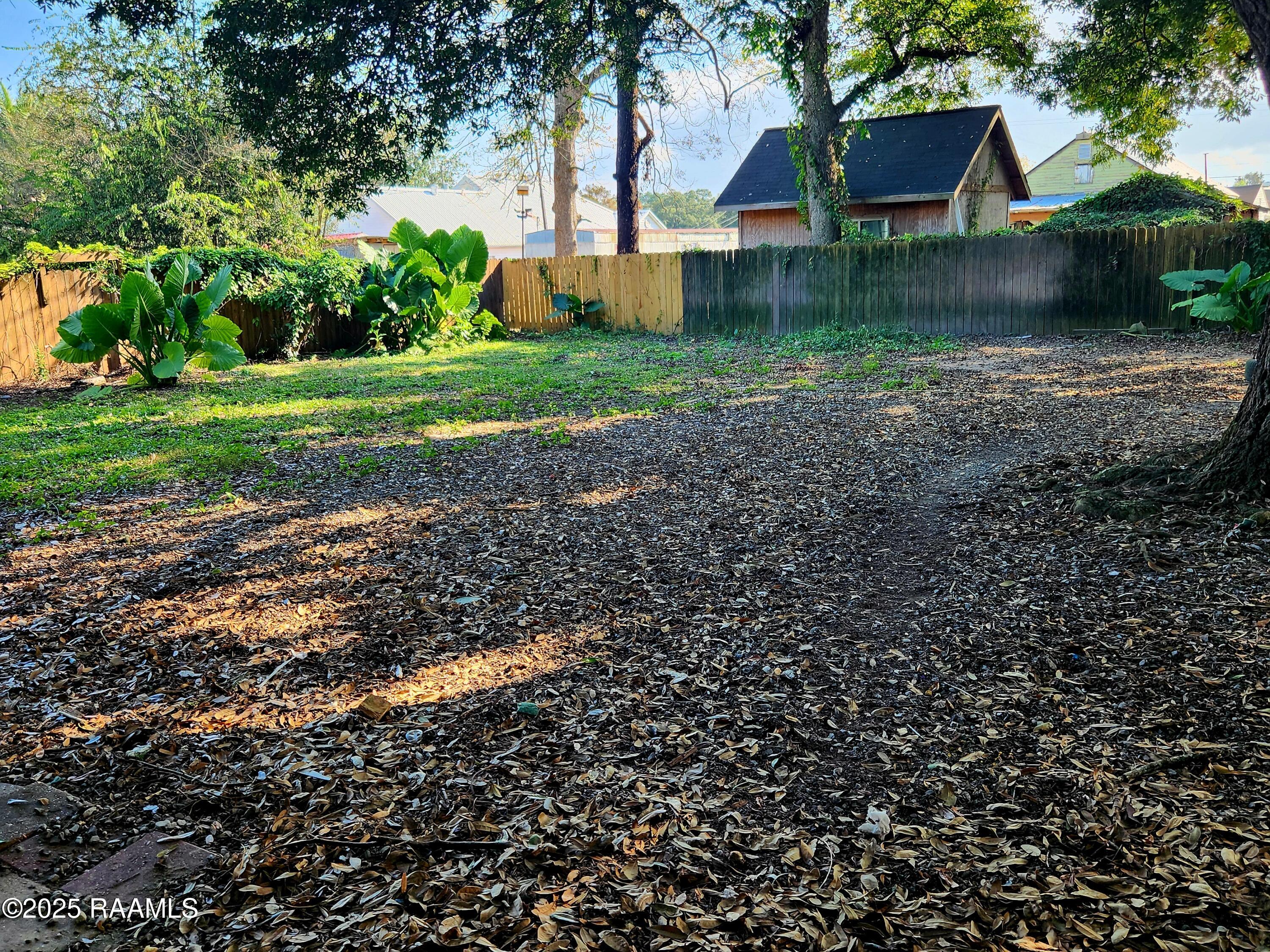 230 Druilhet Street Jeanerette, LA 70544 - Photo 14 of 16 backyard