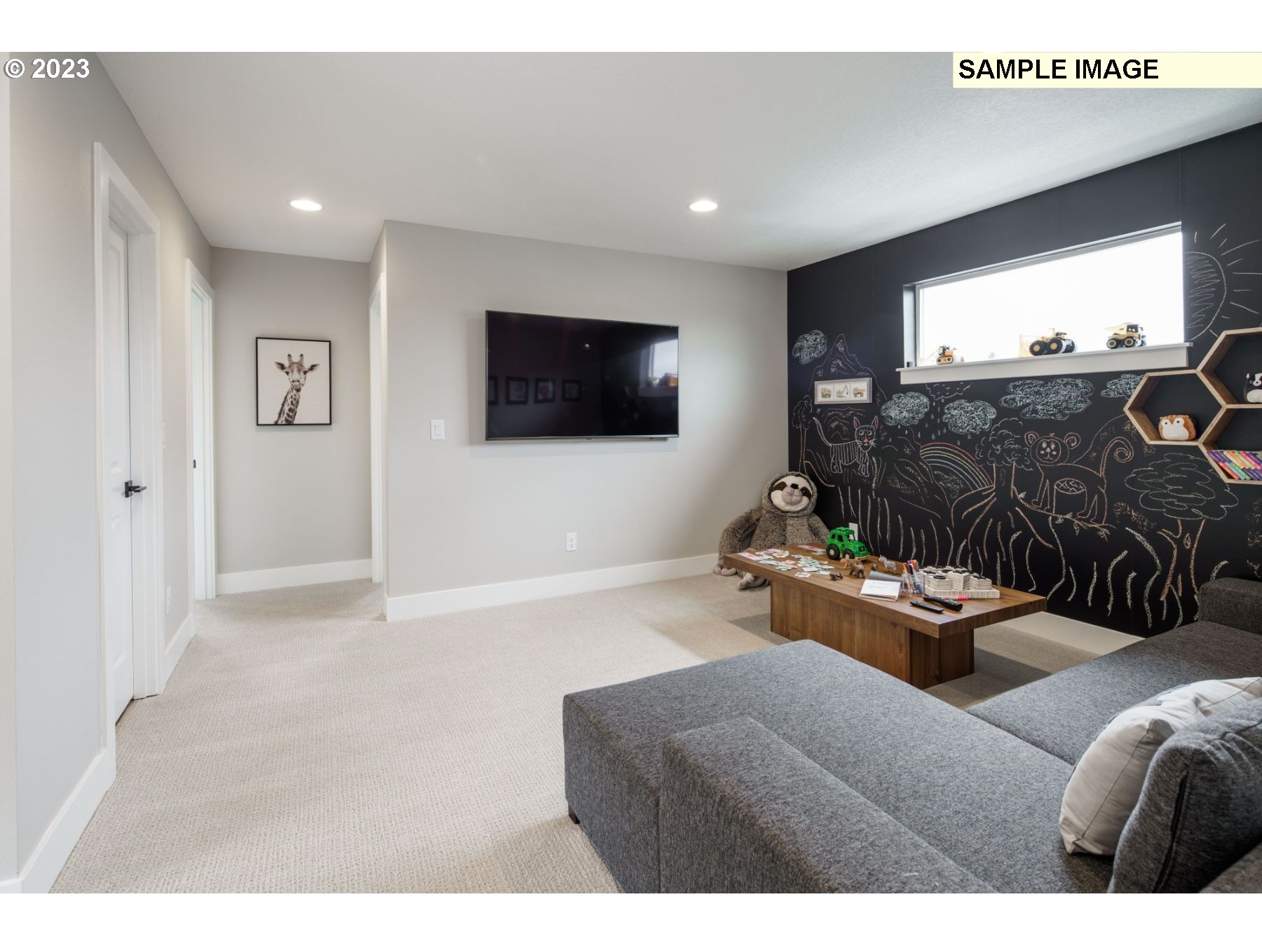 808 Northwest 178th Street Ridgefield, WA 98642 - Photo 14 of 21 a living room with furniture and a flat screen tv