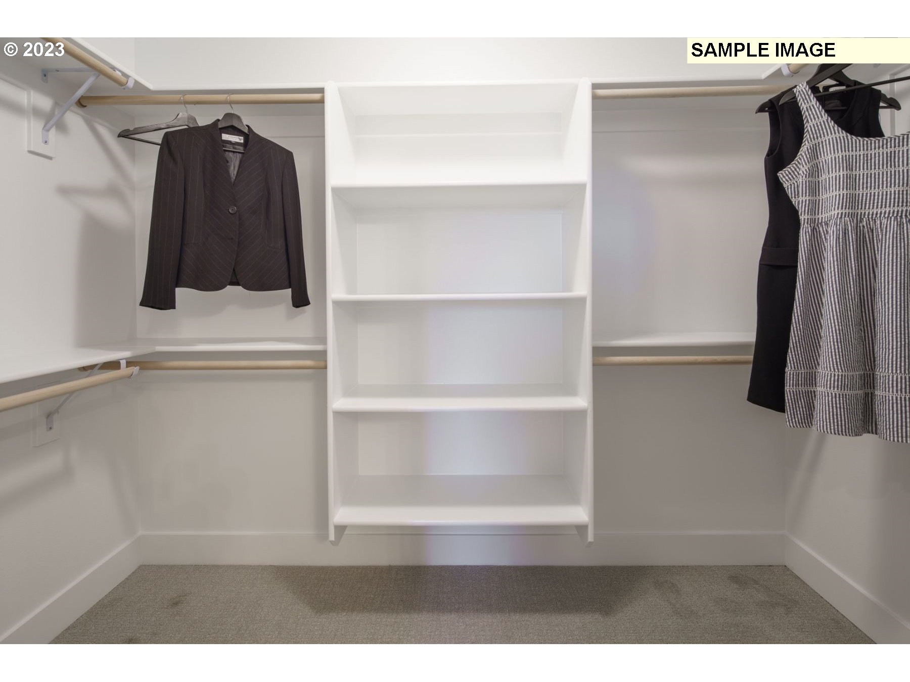 808 Northwest 178th Street Ridgefield, WA 98642 - Photo 18 of 21 a view of walk in closet with clothes and shoes
