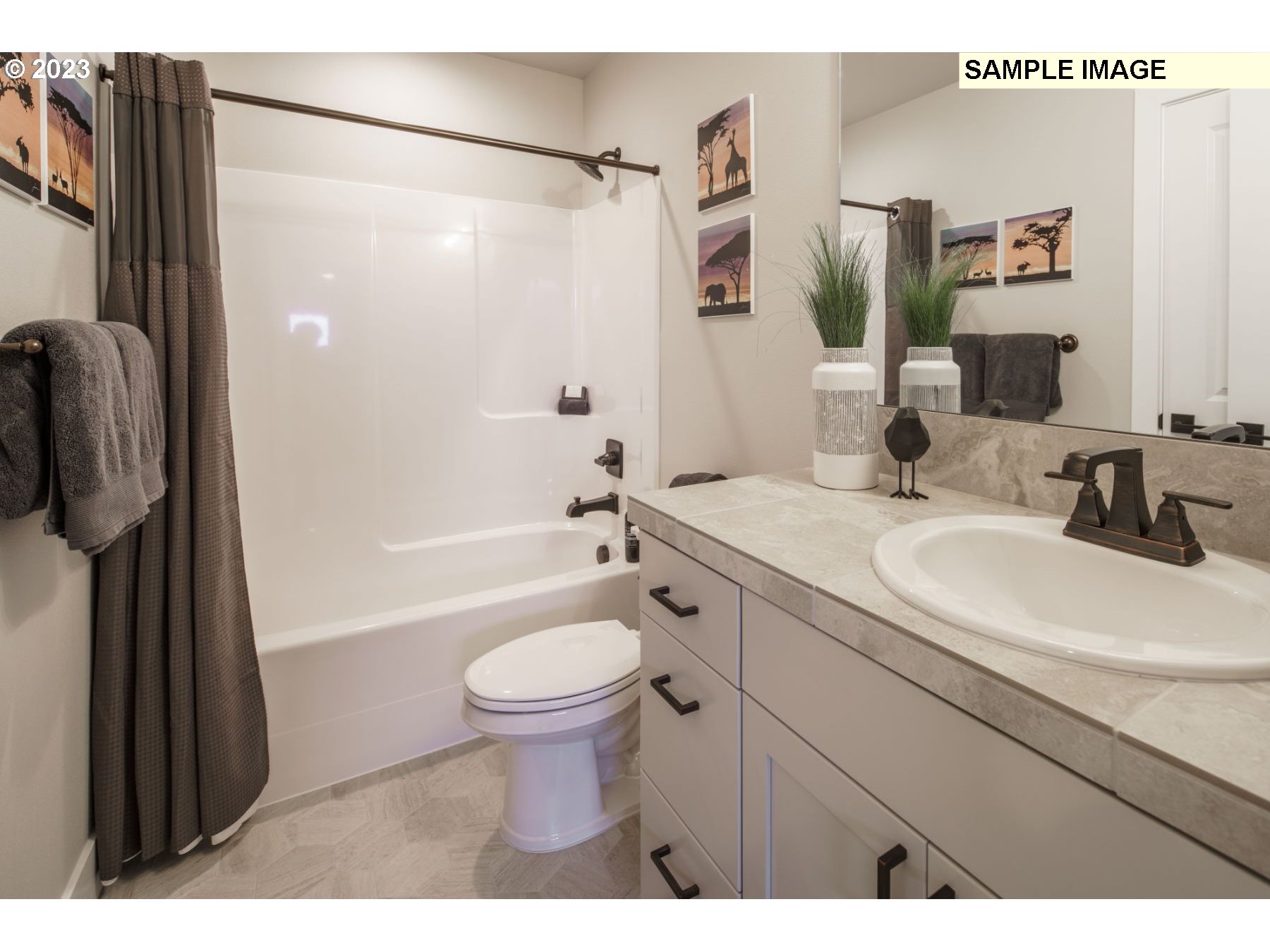 808 Northwest 178th Street Ridgefield, WA 98642 - Photo 20 of 21 a bathroom with a sink a toilet and shower