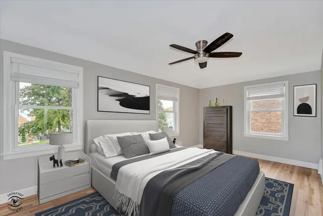 a bedroom with a large bed and a window