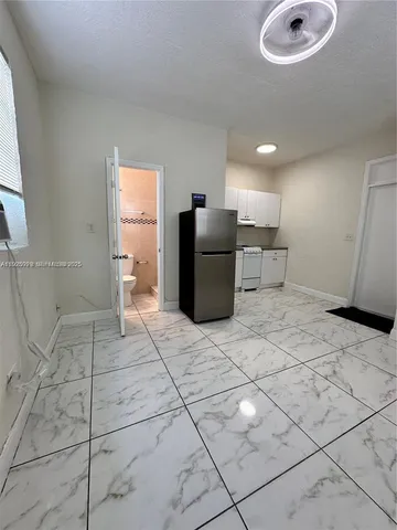 a view of a storage & utility room with washer and dryer