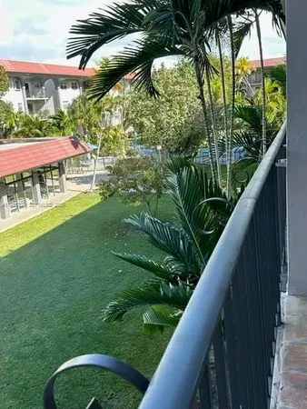 a view of a house with a plant