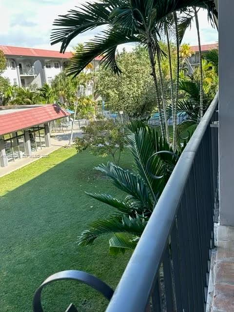 8101 Southwest 72nd Avenue, Unit 312W Miami, FL 33143 - Photo 16 of 19 a balcony with an outdoor space