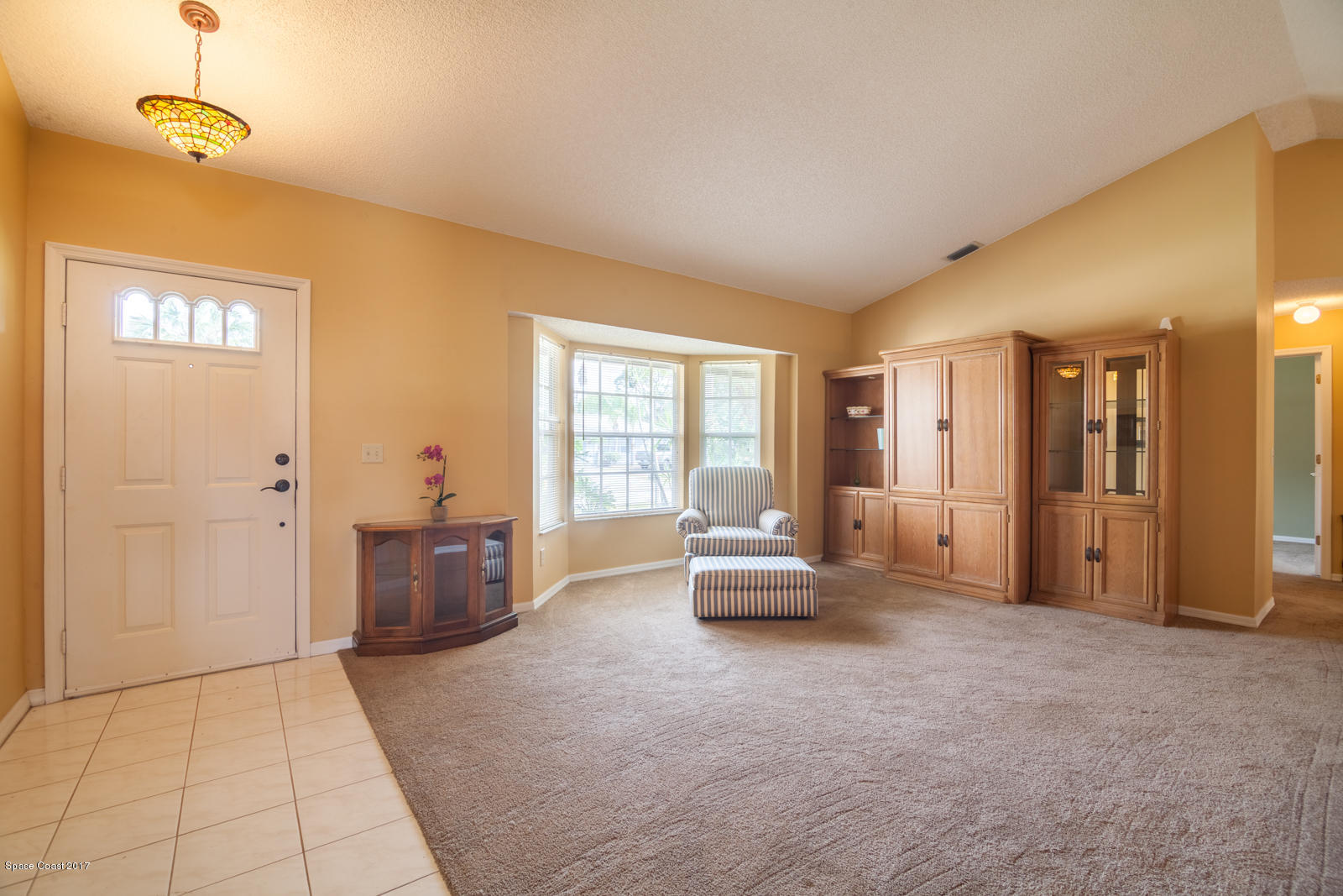 640 Crowberry Road Northeast Palm Bay, FL 32907 - Photo 3 of 16 Formal Living Room