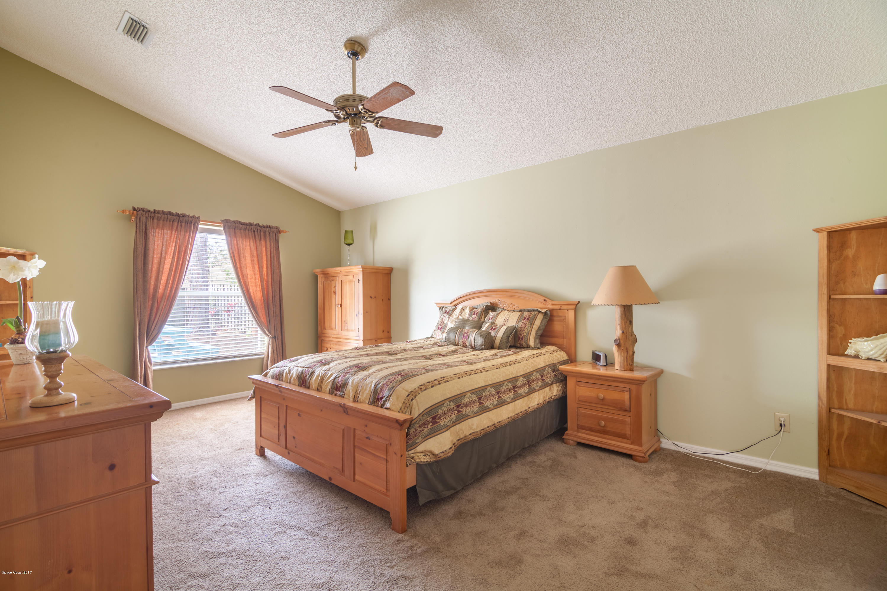 640 Crowberry Road Northeast Palm Bay, FL 32907 - Photo 9 of 16 Master Bedroom