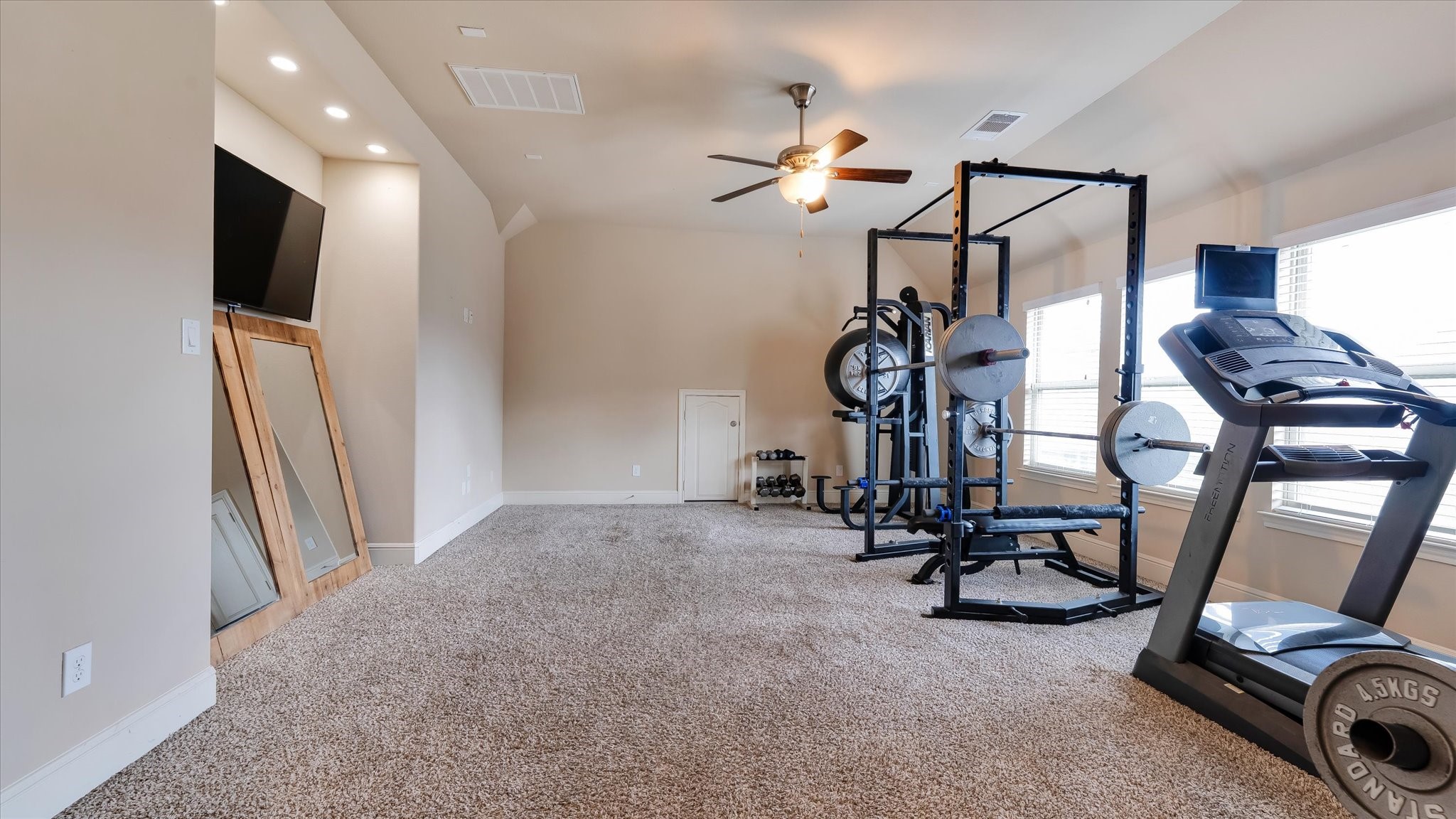 17211 Green Darter Conroe, TX 77385 - Photo 22 of 48 The game room is carpeted with neutral tones, has a ceiling fan, and a nook with recessed lighting