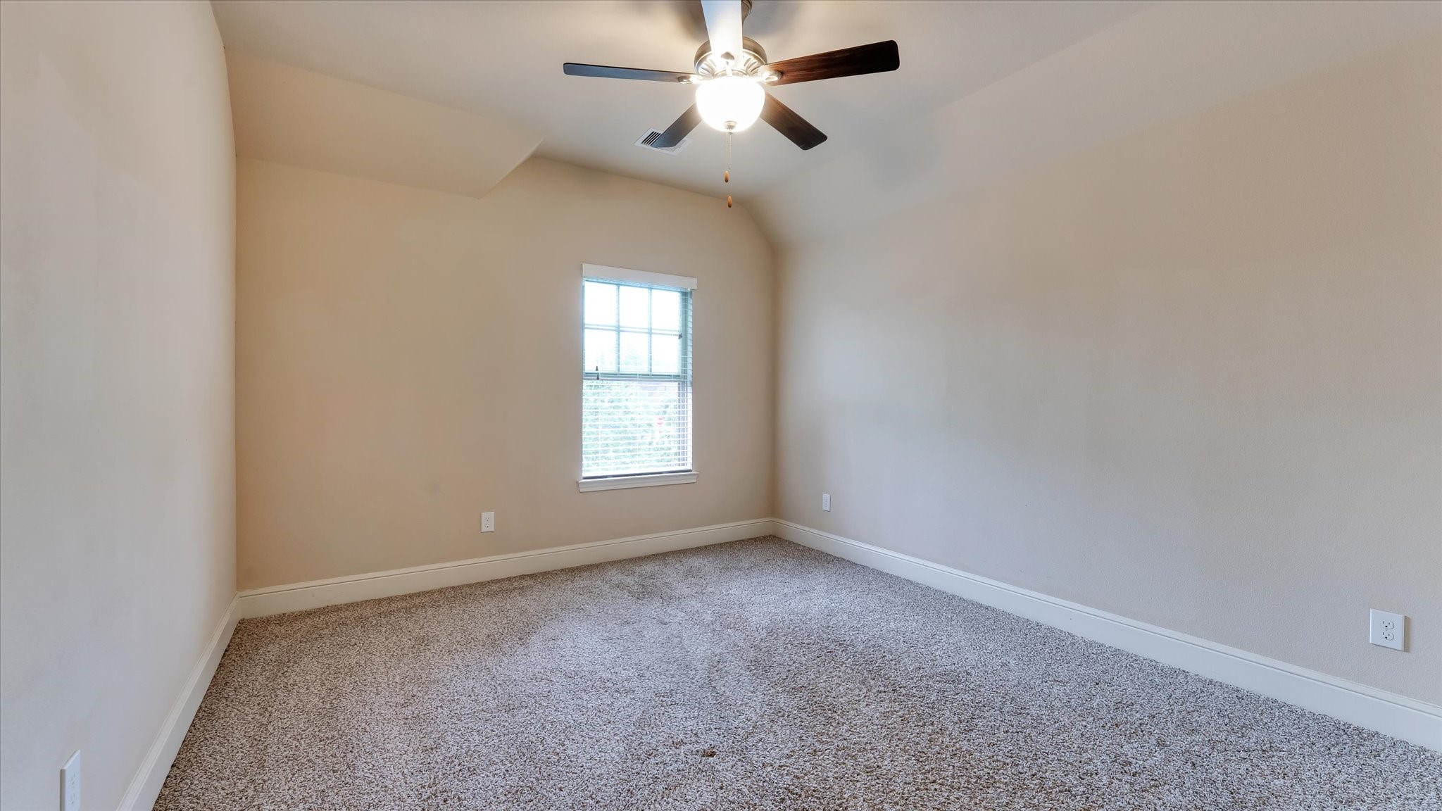 17211 Green Darter Conroe, TX 77385 - Photo 25 of 48 an empty room with windows and fan