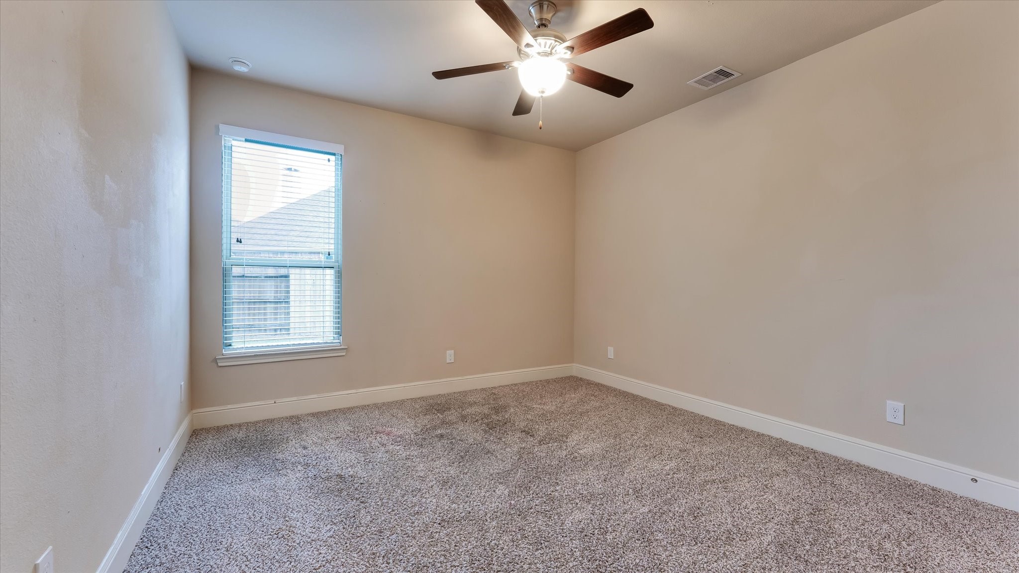 17211 Green Darter Conroe, TX 77385 - Photo 29 of 48 a view of an empty room with a window