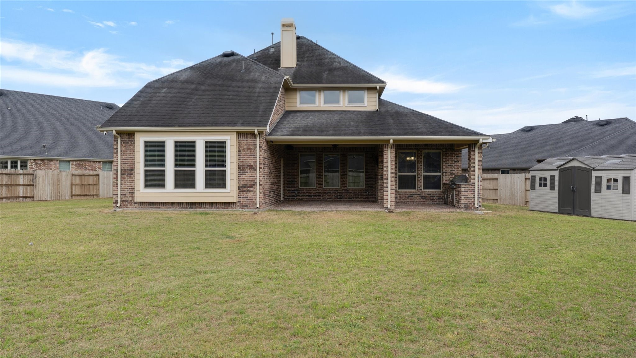 17211 Green Darter Conroe, TX 77385 - Photo 32 of 48 a front view of a house with a garden