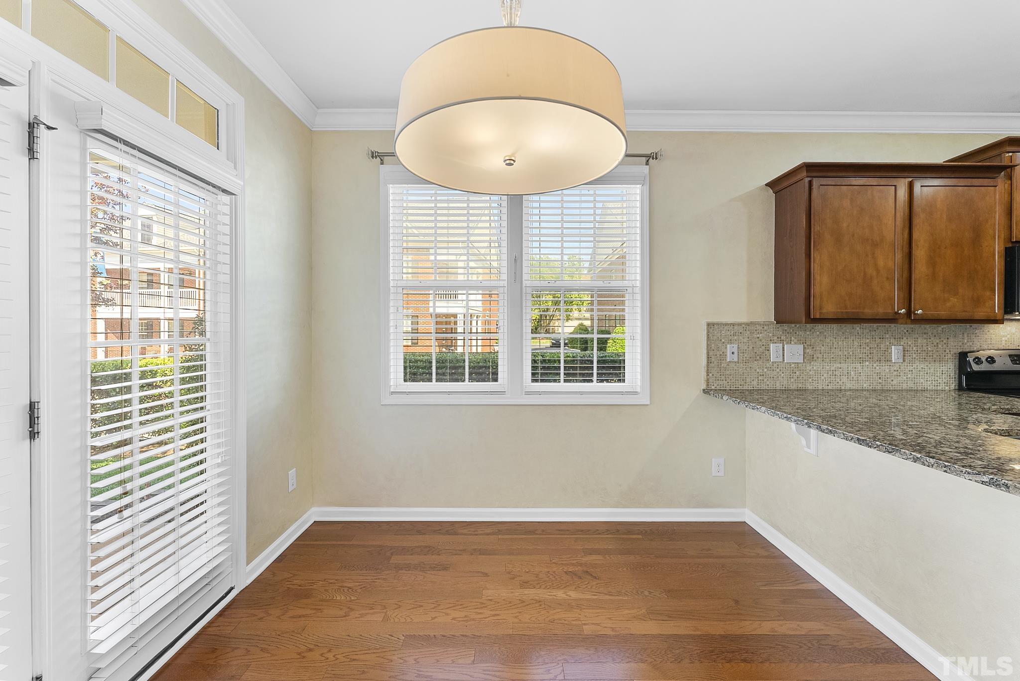 517 Dragby Lane Raleigh, NC 27603 - Photo 13 of 31 a view of a kitchen and a window