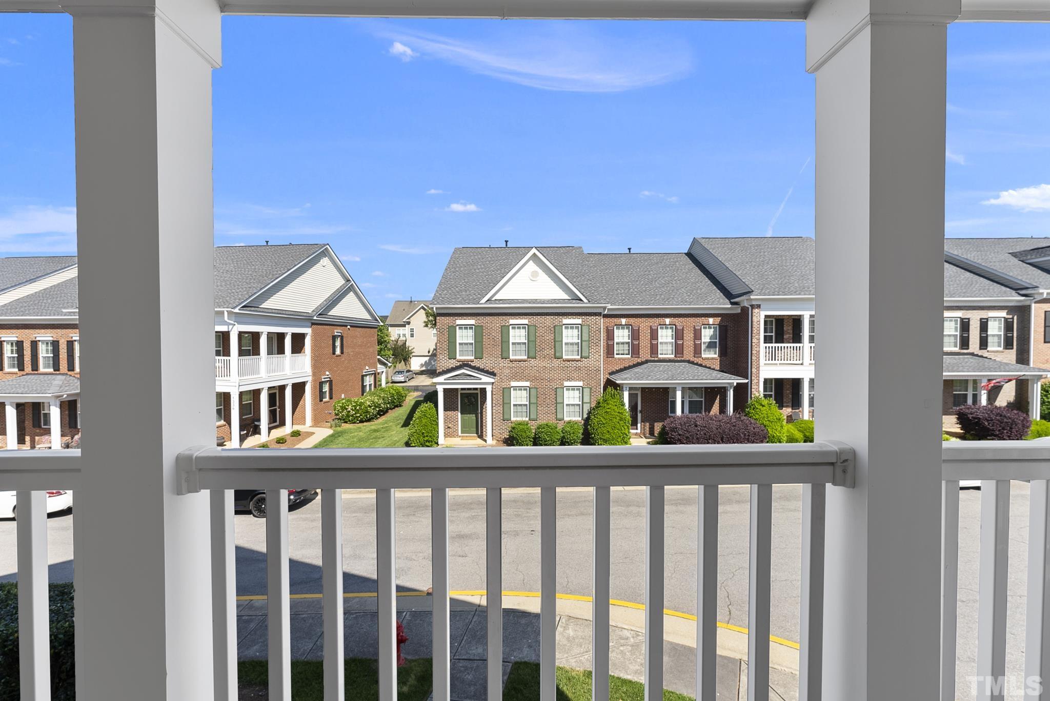 517 Dragby Lane Raleigh, NC 27603 - Photo 28 of 31 a view of a brick house with large windows