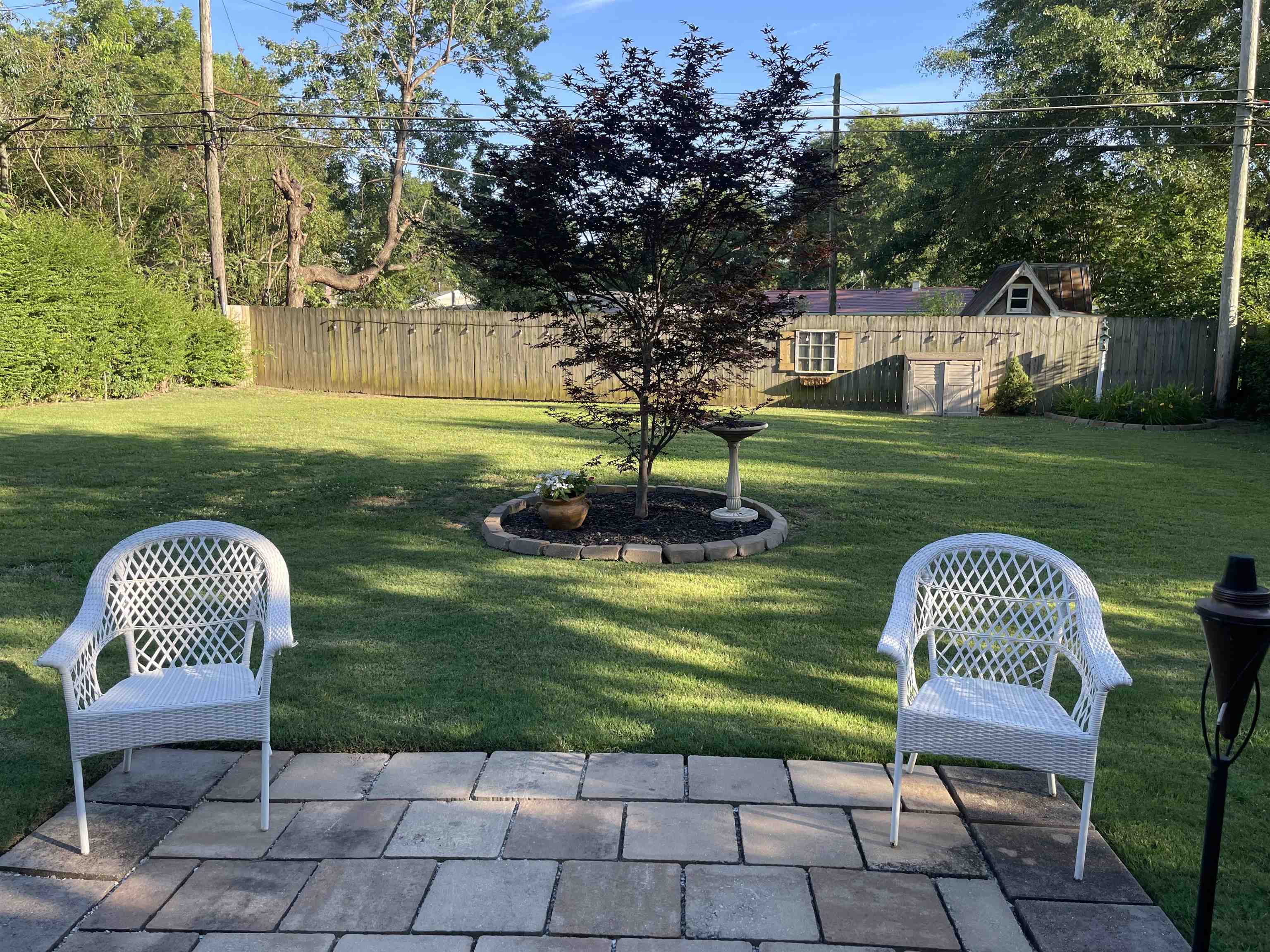 5065 Flamingo Road Memphis, TN 38117 - Photo 11 of 18 a front view of a garden and patio