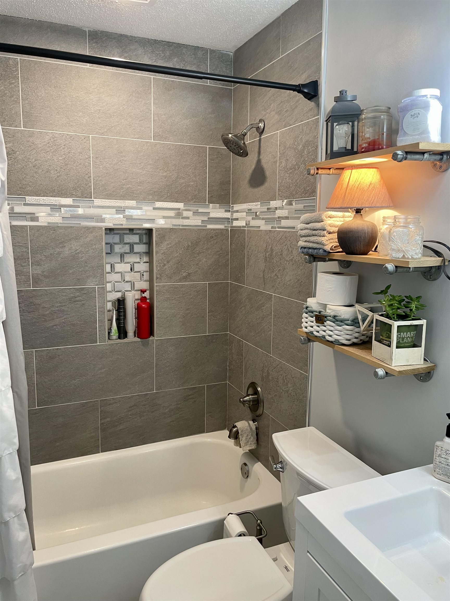 5065 Flamingo Road Memphis, TN 38117 - Photo 9 of 18 a bathroom with a sink and a mirror
