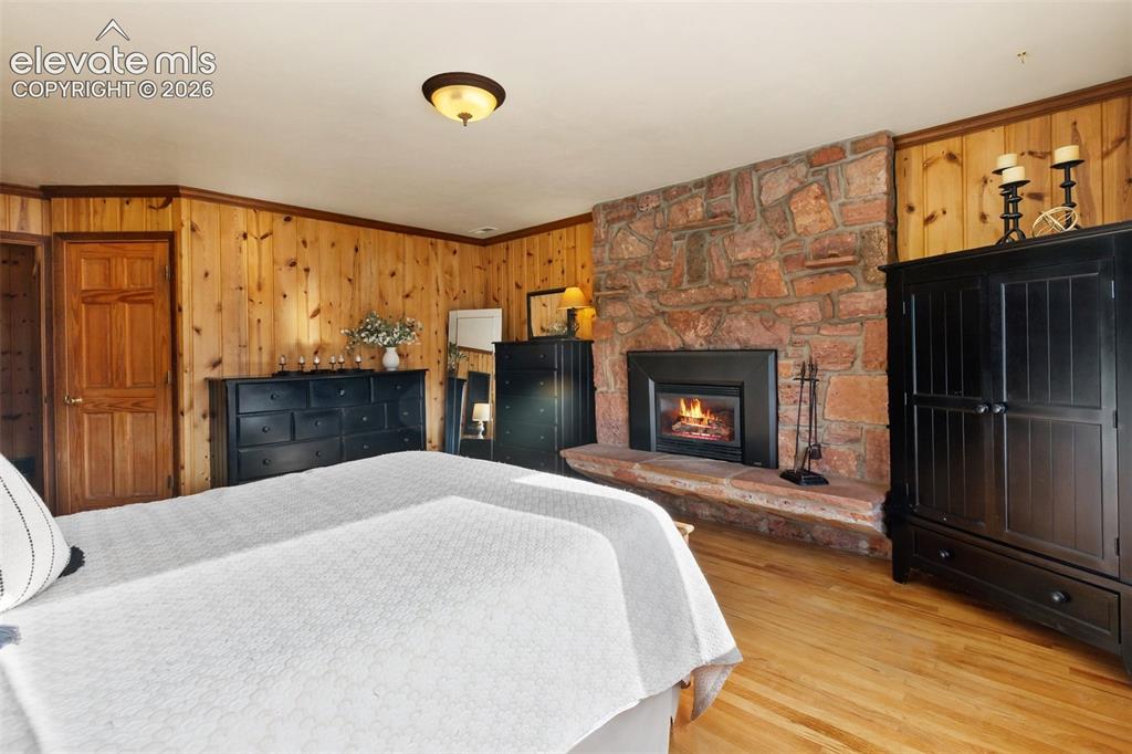 2809 Edlowe Road Woodland Park, CO 80863 - Photo 16 of 42 Primary suite with gas fireplace!