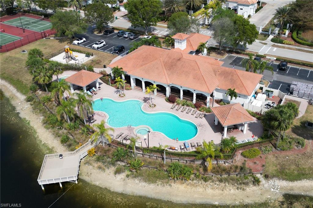 14645 Sutherland Avenue, Unit 87 Naples, FL 34119 - Photo 26 of 38 Resort-style pool and fishing pier