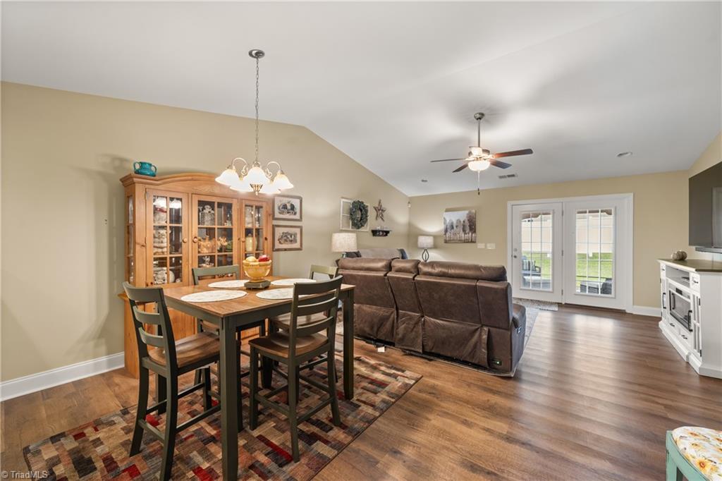 202 Oak Ridge Drive Archdale, NC 27263 - Photo 10 of 33 Dining with vaulted ceiling and accent lighting