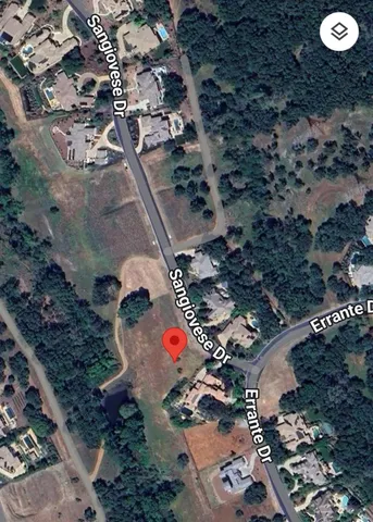 an aerial view of residential house with outdoor space