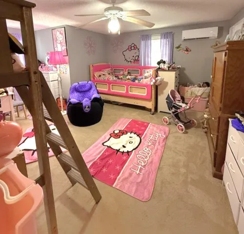 a bathroom with a sink toilet and a mirror