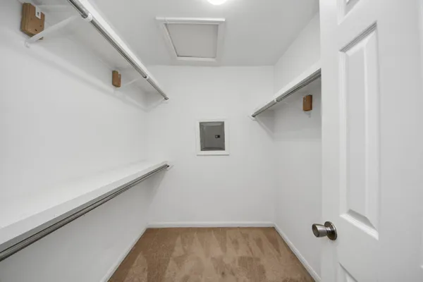 a view of small space with racks on the wall