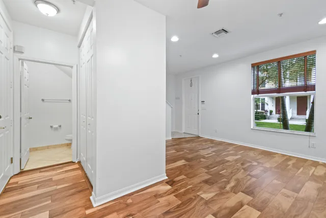 a view of an empty room and window