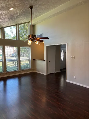 a view of a livingroom with wooden floor